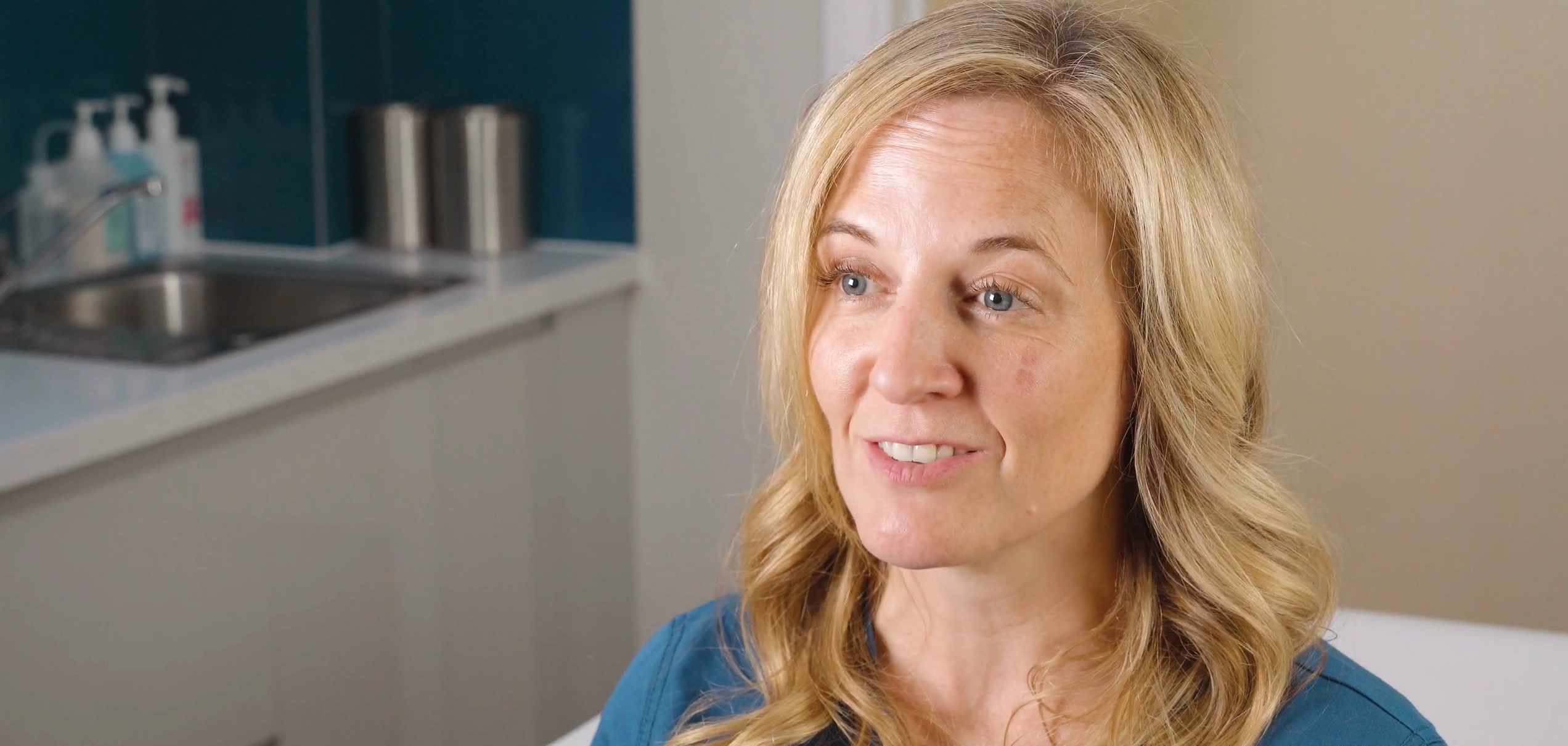 Text "How to manage arthritis over time" with orange swirl on white background.